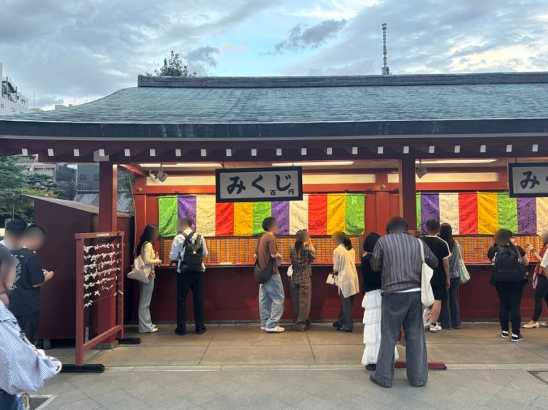 Traditional omikuji fortune paper boxes at Sensoji Temple