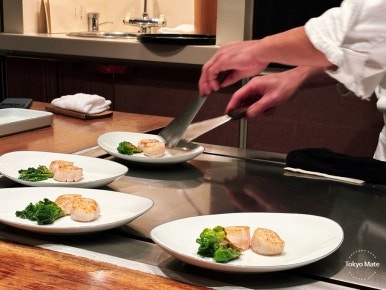 Chef preparing Hokkaido scallop saute