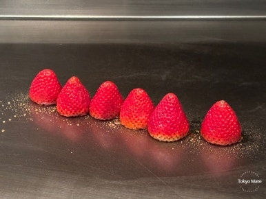 Strawberry flambe preparation at Keyakizaka teppanyaki