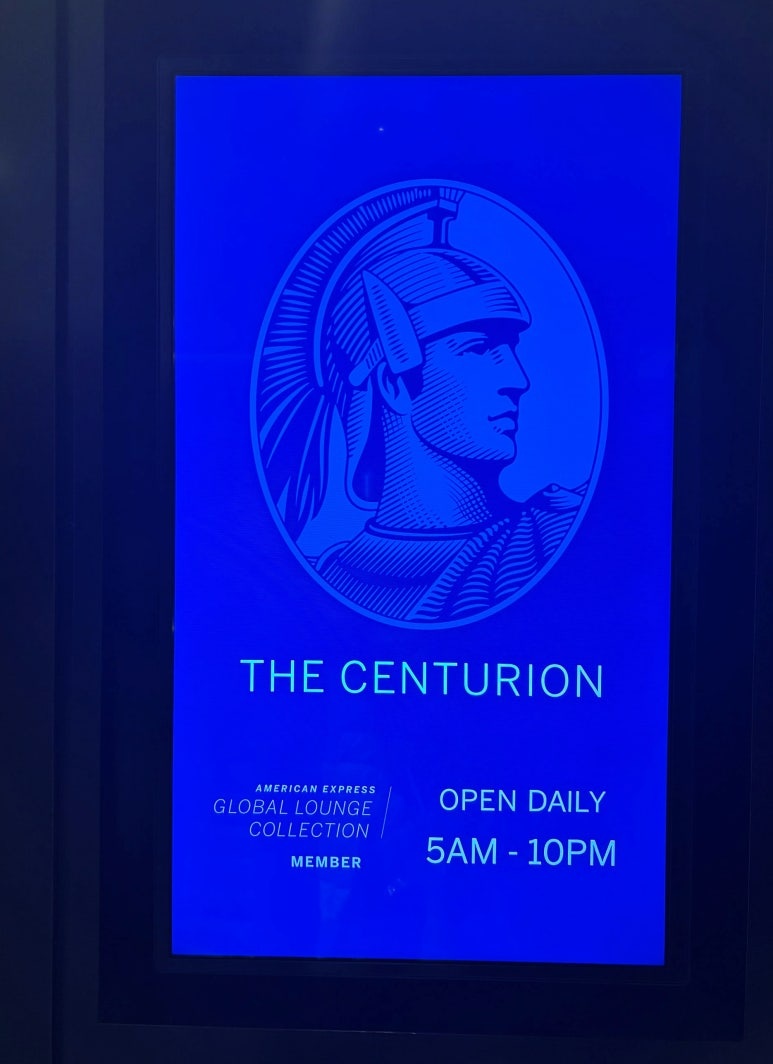 Haneda Airport AMEX Centurion Lounge official hours 5AM-10PM digital signage