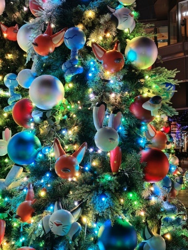 Hibiya Midtown Christmas Zootopia 2 theme tree with animal decorations and Godzilla