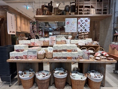 MUJI Ariake bulk food section with coffee beans and nuts