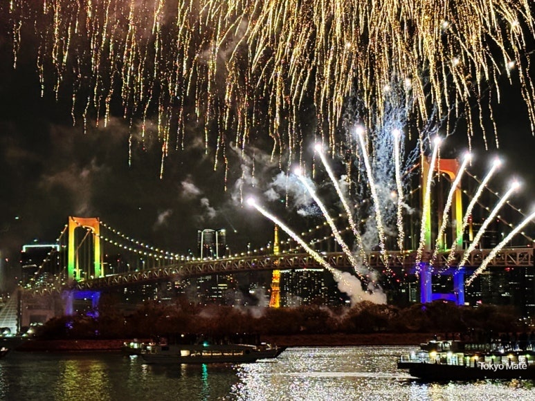 Rainbow Bridge and fireworks from Odaiba Seaside Park