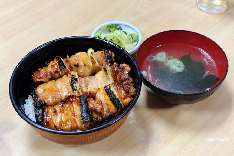 Shibuya Toritake yakitori don with charcoal grilled chicken and tare sauce on rice