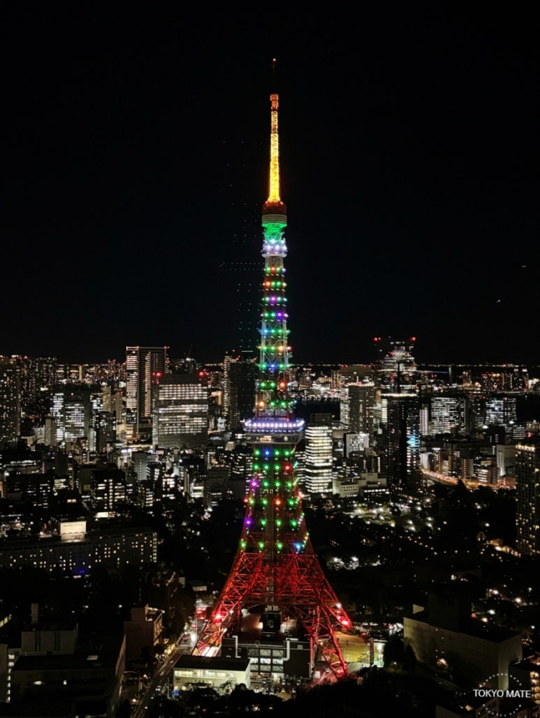 Tokyo Tower seen from Azabudai Hills Sky Room cafe through floor-to-ceiling windows